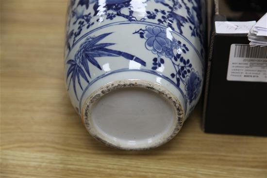 A pair of 19th century Chinese blue and white vases and a wucai jar, repaired 49, 46, 29.5cm